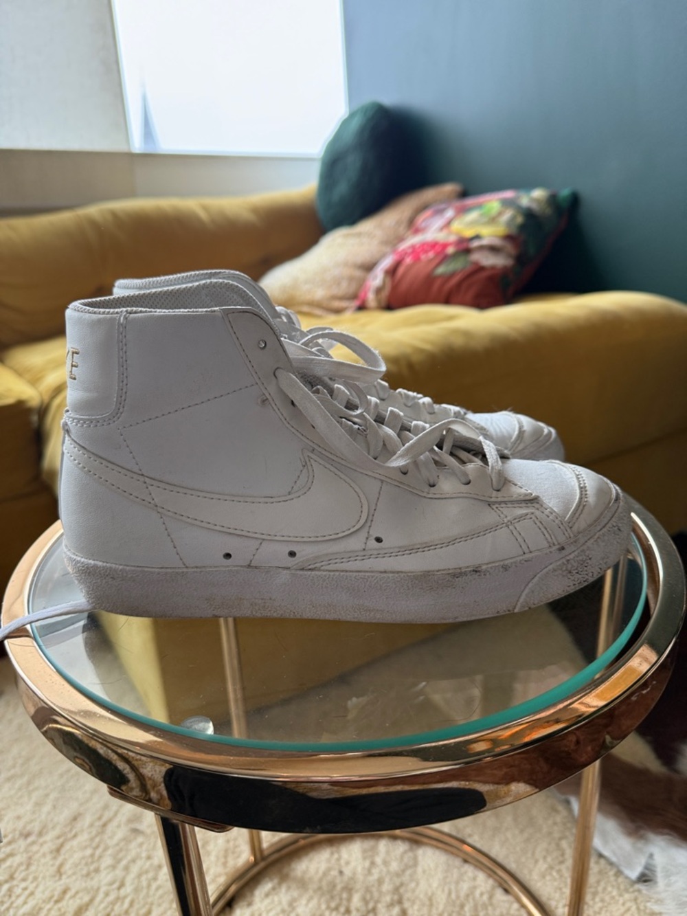 Nike White High-Top Sneakers with Gold Logo